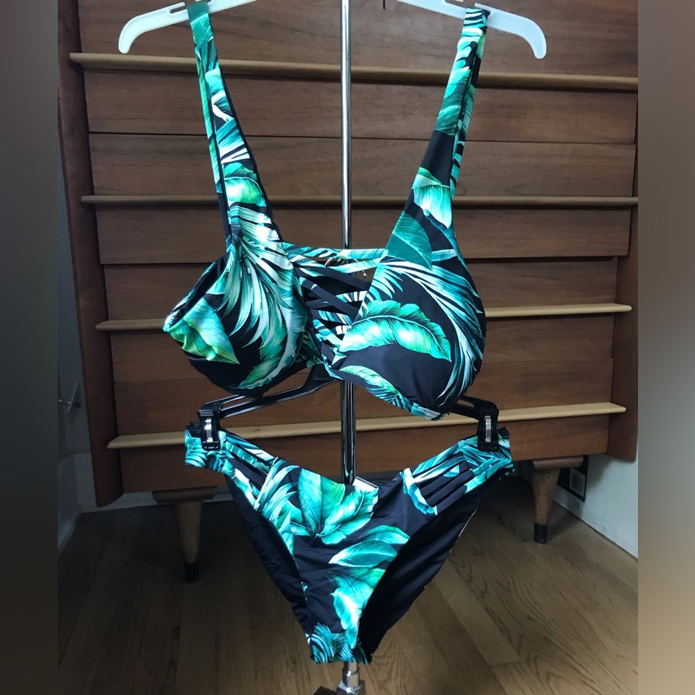 New with tags Tinibikini bikini with a tropical print.